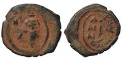 Byzantine Byzantine follis, overstruck on earlier type, circa 7th century. Follis (bronze, 3.67 g, 21 mm), uncertain mint. Nearly very fine.