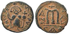 Islamic Time of the Rashidun. Pseudo-Byzantine types, imitative later copy, probably after AH 24 / 645 AD. Fals (bronze, 5.08 g, 23 mm), imitating follis of Constans II. ЄN T૪TO NCPVO Imperial figure 