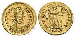 Byzantine Coins THEODOSIUS I (379-395). GOLD Solidus. Constantinople. Obv: D N THEODOSIVS P F AVG. Diademed, helmeted and cuirassed bust facing slightly right, holding spear and shield decorated with 