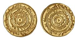 ISLAMIC COINS Fatimids Fatimids al-Mustansir billâh, 427-487 H./1036-1094 AD. Dinar 452 H, Misr, bull's eye type with unusual additional word 'adl engraved above the word al-imâm in the middle obv. ma