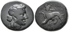 Greek Lydia, Sardes Æ 17mm. Circa 133 BC. Head of Dionysos right, wearing ivy wreath / ΣΑΡΔ[Ι]ΑΝ[ΩΝ], horned panther standing to left, head facing, holding broken spear in jaws; monograms to left and 