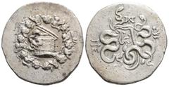 Greek Greek, Mysia, Pergamon AR Cistophoric Tetradrachm. Mysia, Pergamon AR Cistophoric Tetradrachm. c. 123-104. Cista mystica with serpent; all within ivy wreath / Two serpents entwined around bow an