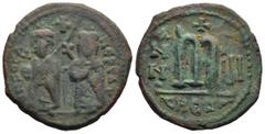 Byzantin Phocas. 602–610. Antioch mint, dated year 3 = 603/604 Follis AE (10.3g 26.8mm) Obv: O N FOCA NЄ PЄ AV, Phocas on left and Leontia on right, standing facing; he holds a globus cruciger while s