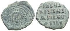 Byzantine Anonymous Æ 40 Nummi. Time of Basil II and Constantine VIII. Constantinople, circa 976-1025. Facing nimbus bust of Christ, holding Gospels /+IhSЧS XRISTЧS bASILЄЧ bASILЄ in four lines. 5.2g 