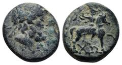 GREEK LYCIA. Choma (1st Century BC) Ae. (15mm, 4.5 g) Obv:Laureate head of Zeus right. Rev: ΧΩ Rider on galloping horse right, club in raised right hand.