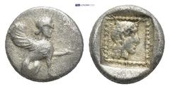 GREEK Dynasts of Lycia. Uvug 470-440 BC. Obol AR (10mm. 1.08 g). Sphinx seated to right, raising left forepaw / Head of female to right.