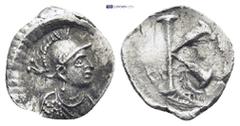 BYZANTINE Justinian I (527 - 565) AR Half Siliqua. Constantinople. (0.64 Gr. 13mm.) Draped and cuirassed bust of Constantinopolis to right, wearing crested helmet. Rev. Large K.