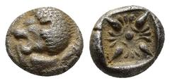 GREEK Ionia, Miletos AR Diobol. Ionia, Miletos AR Diobol. late 6th-early 5th C. BC. (8mm, 1.2 g) Forepart of lion r., head turned back / Stellate design within square incuse.