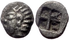 Greek Ionia, Kolophon. AR Tetartemorion, (Silver, 0.13 g 5 mm), Late 6th century BC. Ionia, Kolophon. AR Tetartemorion, (Silver, 0.13 g 5 mm), Late 6th century BC. Obv: Archaic head of Apollo left. Re