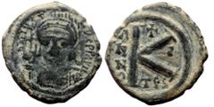 Byzantine Justin II, AE, Half Follis (Bronze, 5.67 g. 21 mm.) Thessalonica, 565-578 AD. Justin II, AE, Half Follis (Bronze, 5.67 g. 21 mm.) Thessalonica, 565-578 AD. Obv: D N IVST[IN]VS P P AVI Helmet