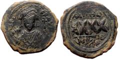 Byzantine Phocas, AE, follis, (Bronze, 12.79 g. 29 mm.) Nicomedia. 602-610 AD. Phocas, AE, follis, (Bronze, 12.79 g. 29 mm.) Nicomedia. 602-610 AD. Obv: [DN FOCAS PERP AVG], crowned, mantled bust faci