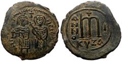 Byzantine Phocas and Leontia. AE, Follis, (Bronze, 12.47 g. 36 mm.) Cyzicus. 602-610 AD. Phocas and Leontia. AE, Follis, (Bronze, 12.47 g. 36 mm.) Cyzicus. 602-610 AD. Obv: DN FOCA VNPER AV, Phocas on