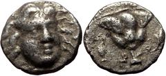 Greek coins CARIA. Rhodos. Rhodes. AR Hemidrachm or Diobol (Bronze, 1.16g, 10mm) ca 205-190 BC, Unknown magistrate. Obv: Head of Helios facing slightly right. Rev: (illegible magistrate name), rose wi