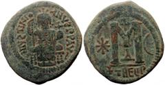 Byzantine coins Justinian I (527-565) AE Follis (Bronze, 34mm, 15.73g) Theoupolis (Antioch), 531-537. Obv: D N IVSTINIANVS P P AVS, Justinian seated facing on throne, wearing crown with pendilia and h