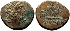 Greek coins Paphlagonia, Sinope AE (Bronze, 7.56g, 21mm) ca 85-65 BC. Obv: Laureate head of Zeus to right. Rev: ΣINOΠHΣ Eagle standing left on thunderbolt, wings spread and head to right; to left, mon