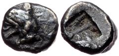 Greek Ionia, Teos AR Tetartemorion (Silver, 0,12g, 4mm) ca 540-500 BC. Ionia, Teos AR Tetartemorion (Silver, 0,12g, 4mm) ca 540-500 BC. Obv: Head of griffin to left Rev: Incuse square with central pel