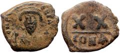 Byzantine Phocas (602-610) Half AE Follis (Bronze, 5.20g, 22mm) Constantinople. Phocas (602-610) Half AE Follis (Bronze, 5.20g, 22mm) Constantinople. Obv: D N FOCAS PERP AVC, Crowned bust facing, wear