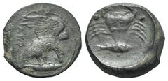 Greek Sicily, Akragas, c. 425-406 BC. Æ Tetras (17mm, 5.99g, 9h). Eagle standing r. on fish, head lowered, wings spread. R/ Crab; conch below, three pellets. Westermark, Coinage, 973-4; HGC 2, 148. VF