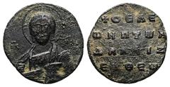 Seal & Weight & Token AE Byzantine tessera of charity (AD 10th–11th centuries). Obv: Half-length representation of Christ lightly bearded, wearing a tunic and himation and holding the right hand in bl