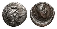 Greek Dynasts of Lycia.Uncertain mint. AR Obol, 0.69 g 8.30 mm. Kherei 410-390 BC. Obv: Head of Athena right, wearing crested Attic helmet. Rev: Bearded head of dynast right, wearing kyrbasia, within 