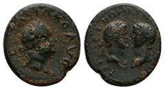 Roman Provincial Uncertain. Vespasian with Titus and Domitian, AD 69-79. AE. 3.90 g. 18.56 mm. Obv: VESPASIANO AVG. Laureate head of Vespasian, right. Rev: TITO ET DOMITIANO CAES. Bare heads of Titus 