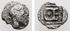 Greek Ionia, Magnesia ad Maeandrum. Themistokles, ca. 465-459 BC. AR, Trihemitartemorion. 0.25 g. - 7.92 mm. Obv.: Bearded head of Hephaistos to right, wearing laureate pilos; Θ behind head [and E bef
