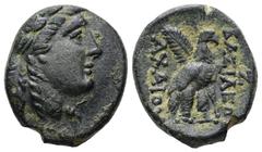 Greek Seleukid Kingdom. ACHAIOS (USURPER, 220-214 BC). AE. 5.06 g. - 19.12 mm. Sardes. Obv.: Laureate head of Apollo right. Rev.: BAΣIΛEΩΣ / AXAIOY. Eagle standing right, with palm frond over shoulder