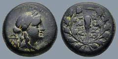 Greek LYDIA. Sardes. (Circa 2nd-1st centuries BC) AE Bronze (14,9mm 4,3g) Obv: Laureate head of Apollo right; monogram behind head Rev: ΣAPΔIA / NΩN. Club right within wreath GRPC Lydia 53 (monogram) 