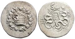 Greek Greek, Mysia, Pergamon AR Cistophoric Tetradrachm. Mysia, Pergamon AR Cistophoric Tetradrachm. c. 123-104. Cista mystica with serpent; all within ivy wreath / Two serpents entwined around bow an