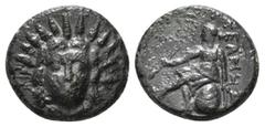 Greek Coins LYCIA. Telmessos.(Late 3rd century-190/89 BC). Ae. Obv : Radiate and draped bust of Helios facing. Rev : TEΛMH/ΣEΩN. Apollo seated left on omphalos, holding bow in left hand and arrow in r