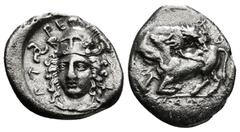 Greek Coins DYNASTS OF LYCIA. Perikles and Vedrei, circa 380-370 BC. 1/8 Stater or Trihemiobol, Antiphellos. Vädäviä (in Lycian) Lion leaping to right, on the back of a bull moving to left. Rev. Pärik
