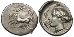 SICILY. Syracuse. Ca. 415 BC. Silver tetradrachm (17.18 gm). Signed on the reverse by the artist Sosion. Fast quadriga left with horses in parallel action, above Nike ﬂying right to crown charioteer /