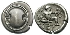 BOEOTIA. Thebes. Ca. 425–395 BC. Silver stater (12.01 gm). Beotian shield / ΘE, infant Heracles seated facing on ground, head right, holding snake in each hand, bow in upper left ﬁeld. SNG Lockett 174