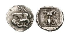 ELIS. Olympia. Ca. 440-430 BC. Silver hemidrachm (2.97 gm). Eagle ﬂying right, with both wings extended, grasping hare by the belly with talons and tearing at it with beak / F—A, thunderbolt with wing