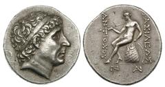 SELEUCID KINGDOM. Antiochus II (261-246 BC). Silver tetradrachm (17.12 gm). Sardes. Diademed head of the deiﬁed Antiochus I right / ΒΑΣΙΛΕΩΣ ΑΝΤΙΟΧΟΥ, Apollo seated left on omphalos, examining arrow a