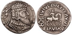 KINGS OF KHWAREZM. Artav (Artabanos). First century AD. Silver tetradrachm (13.54 gm). Diademed and bearded bust of Artav right, wearing helmet with neckguard and decorative cuirass, crown-bearing Nik