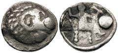 ARABIA OR THE PERSIAN GULF REGION. Uncertain mint. Third to second century BC. AR tetradrachm (16.26 gm). Head of young Heracles right in lion skin headdress, of local style / Male deity of local styl