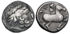 EARLY IMITATIONS OF PHILIP II TETRADRACHMS. AR tetradrachm (10.56 gm). Birnenscheitel type. Laureate head of Zeus right / Horseman right, T behind. Göbl OTA 74/1. Kostial 396. Toned. A few minor scrat