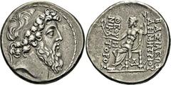 Tétradrachme. A/. Tête barbue et diadémée à droite, dans un cordon de laine. R/. Zeus nicéphore assis à gauche. Delta sous le siège. - Références : BMC, n° 18 var. - Pozzi, n° 3005 var. - Argent. 16,0