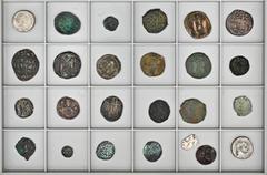 BYZANTINE COINS LOTS BYZANTINISCHER MÜNZEN Lot meist byzantinischer Bronzemünzen: Das Lot enthält 19 Bronzeprägungen von Justinian I. bis Johannes V., dazu 2 ayyubidische Fals und eine beschnittene in