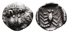 Greek Caria, Mylasa. Circa 450-400 BC. AR Tetartemorion (7mm, 0.24 g.). Facing forepart of lion. Rev. Scorpion within incuse square. HN Online 973; SNG Kayhan 934 for Hemiobol. Slightly chipped edge. 