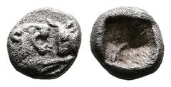 Greek Kings of Lydia, Kroisos circa 561-546 BC. AR 1/24 Stater (6 mm. 0,43 g.). Sardes. Confronted foreparts of lion to right and bull to left. Rev. Incuse punch. GRPC Lydia S10; SNG Tübingen 3652-3. 