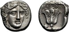 Caria, Rhodes. 408/7-405/4 BC. Tetradrachm, 15.29g (12h). Obv: Head of Helios three-quarters right. Rx: ΡΟΔΙΟΝ Rose; pecten at lower left. Bérend 6. Exceptional style and preservation; among the fines