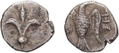 Ancient Jewish Judaea, Jerusalem. Yehud. Hemiobol. Persian Period, before 333 BCE. Hemiobol, 0.37g (4h). Obv: Lily flower. Rx: Falcon standing front, head right, wings spread, to right Hebrew inscript