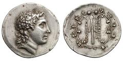 The Artists of Dionysus. Ca. 155 BC. Silver tetradrachm (16.87 gm). Struck at Teos. Head of young Dionysus right, wearing mitre and wreathed with ivy / ΤΩΝ ΠΕΡΙ ΤΩΝ ΔΙΟΝΥΣΟΝ ΤΕΧΝΙΤΩΝ, filleted thyrsus