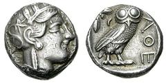 ATHEN. Tetradrachme. 479-393. Behelmter Athenakopf r. Rs: Eule r., dahinter Olivenzweig und Mondsichel. SNG COP. 32 ff. Svoronos Taf. 12-16. 17,2g. Hohes Relief. Min. korrodiert. Vs. kl. Kratzer. Etw.