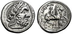 KELTEN DONAUKELTEN IMITATION DER TETRADRACHME PHILIPPOS II. Tetradrachme. Unmittelbare Nachprägung mit vollständiger Legende. Belorbeerter Zeuskopf r. Rs: Reiter mit Zweig rechts. Beizeichen Delphin. 