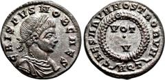 Roman Imperial Coins CRISPUS (Caesar, 316-326). Follis. Aquileia. Obv: CRISPVS NOB CAES. Laureate, draped and cuirassed bust right. Rev: CAESARVM NOSTRORVM / AQT. VOT / V in two lines within wreath. R