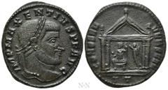 Roman Imperial Coins MAXENTIUS (307-312). Follis. Ticinum. Obv: IMP MAXENTIVS P F AVG. Laureate head right. Rev: CONSERV VRB SVAE / TT. Tetrastyle temple containing Victory standing left, crowning Rom