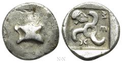 Greek Coins DYNASTS OF LYCIA. Mithrapata (Circa 390-370 BC). Obol. Obv: Astragalos. Rev: Triskeles; to left, Corinthian helmet right; all within incuse square. Müseler VII, 85. Condition: Very fine. W